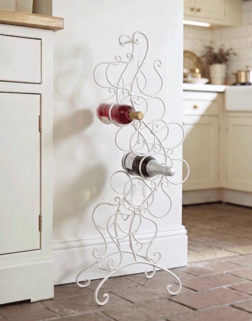 The "Dickory Cottage" Vintage Style Free Standing Wine Rack Placed on a Trafitional Stone Tile Floor in a Cottage Kitchen - Digital Illustration The "Dickory Cottage" Vintage Style Free Standing Wine Rack Placed on a Trafitional Stone Tile Floor in a Cottage Kitchen - Digital Illustration
