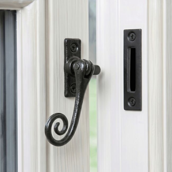 The "Grenhurst" Iron Window Casment Stay Mounted on a Classic White Window Frame in a Country Home - Digital Illustration