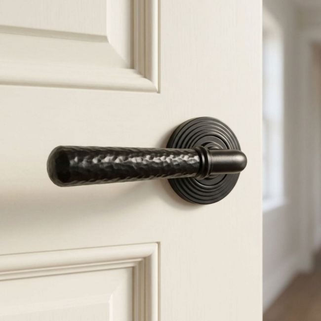 Midnight Black Hammered Unsprung Lever Door Handle on Beehive Rose
