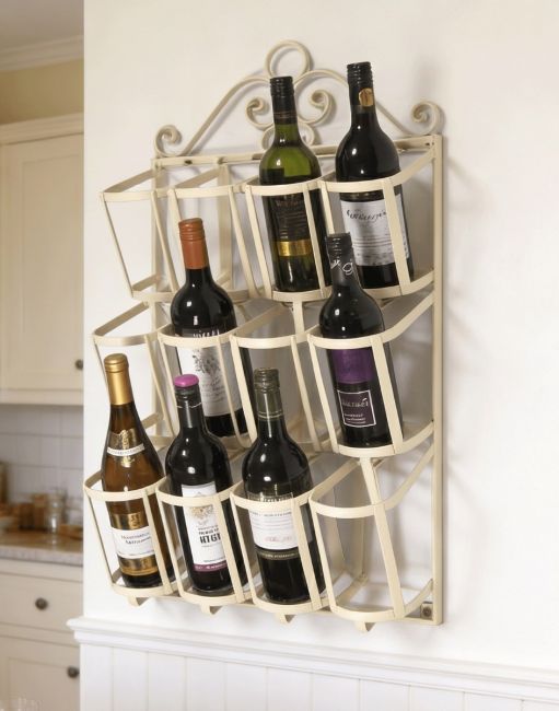 The "Jenevieve" Wall Mounted Wine Rack in a Cream Finish Mounted on a White Wall in a Modern Kitchen - Digital Illustration The "Jenevieve" Wall Mounted Wine Rack in a Cream Finish Mounted on a White Wall in a Modern Kitchen - Digital Illustration