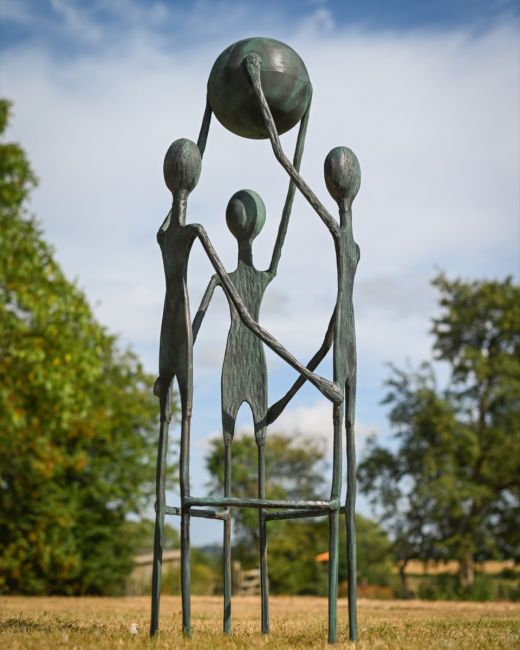 The "Lift" Cast Aluminium Garden Sculpture on a Sunny Garden Lawn