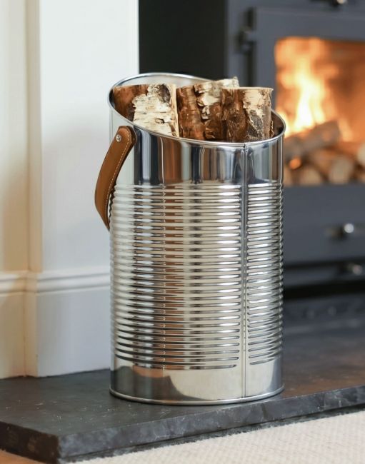 The "Mckinley Lodge" Angled Stainless Log and Coal Hod Displayed on a Fire place in a Modern Home - Digital Illustration The "Mckinley Lodge" Angled Stainless Log and Coal Hod Displayed on a Fire place in a Modern Home - Digital Illustration
