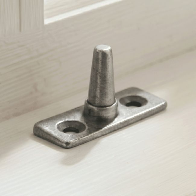 The "Redmont" Antique Pewter Bevel Stay Pin on a Class Wooden Windowsill in a Country Home - Digital Illustration