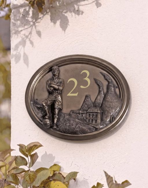 A Number 23 "Wembley Stadium" Footballer House Number Sign in a Bronze Finish Mounted on a Cream Coloured Cottage Wall - Digital Illustration A Number 23 "Wembley Stadium" Footballer House Number Sign in a Bronze Finish Mounted on a Cream Coloured Cottage Wall - Digital Illustration