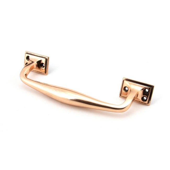 The 230mm Swelled Grip Pull Handle with Roses in Polished Bronze on a White Background 