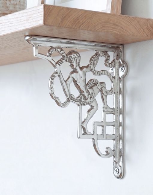 The 24 x 20cm Cherub Design Bright Chrome Bracket on a White Wall in a Modern Home - Digital Illustration