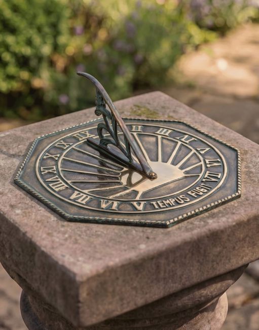 The 250mm Antique Brass "Copernicus" Sundial Placed On Top of a Stone Garden Pillar in the Sun - Digital Illustration The 250mm Antique Brass "Copernicus" Sundial Placed On Top of a Stone Garden Pillar in the Sun - Digital Illustration