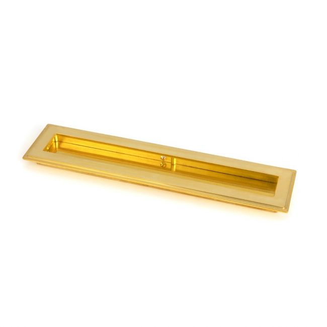 The 250mm Art Deco Rectangular Flush Pull Handle in Polished Brass Shown on its Side on a White Background