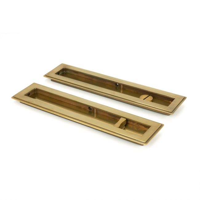 The 250mm Art Deco Rectangular Sliding Pocket Door Privacy Set in Aged Brass Showing the Front and Back Section from an Angle