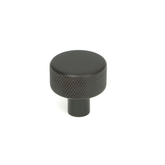 The 25mm Knurled Cabinet Knob (No Rose) in Aged Bronze Shown Upright on a White Background 