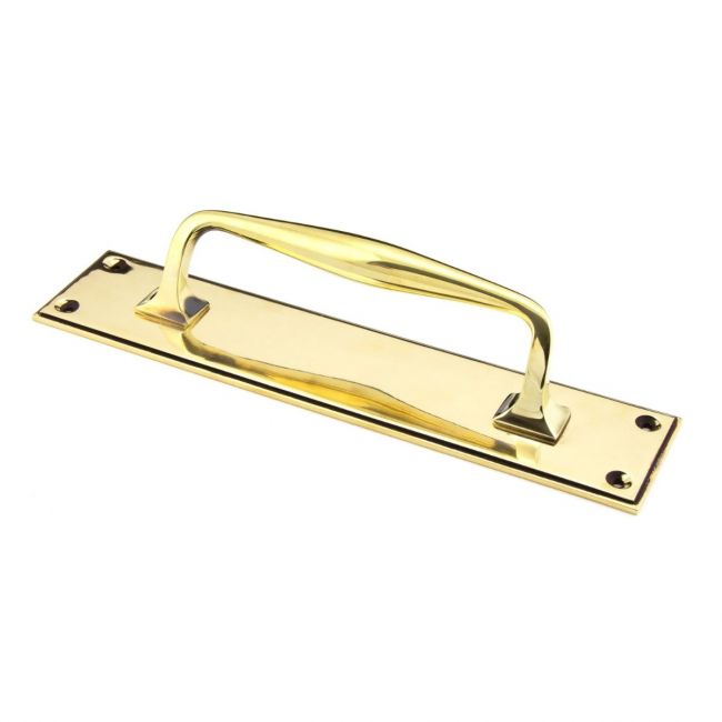 The 300mm Swelled Grip Door Handle with Backplate in Aged Brass on a White Background The 300mm Swelled Grip Door Handle with Backplate in Aged Brass on a White Background
