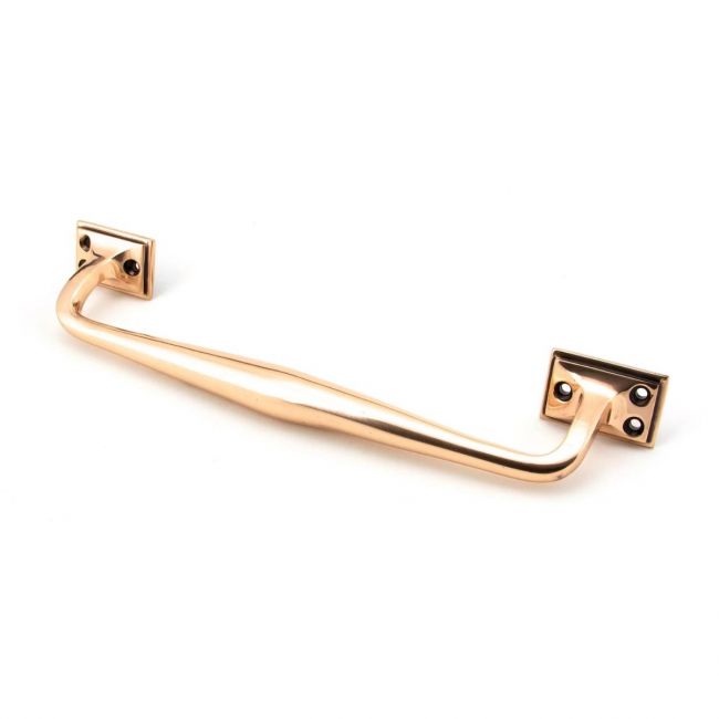 The 300mm Swelled Grip Pull Handle with Roses in Polished Bronze on a White Background 