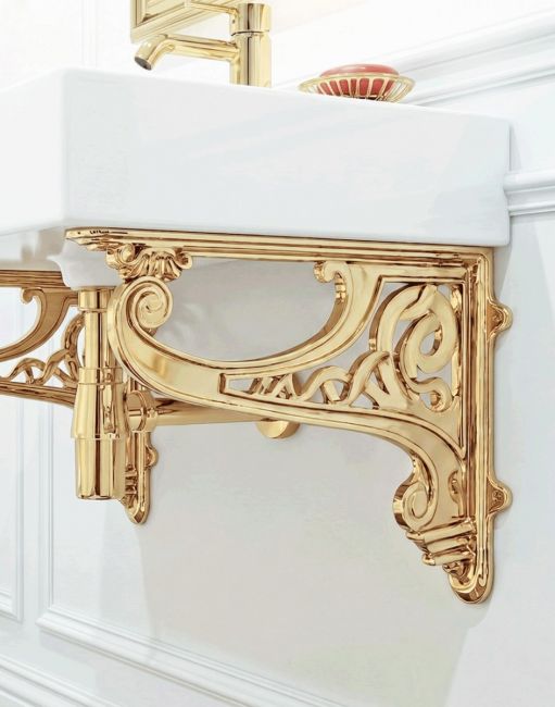 The 30 x 42cm "Celtic" Wall Bracket in a Brass Finish Mounted on a White Kitchen Wall Supporting a Sink - Digital Illustration