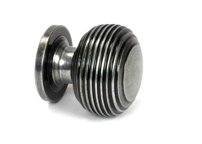 The 30mm "Garrison" Ribbed Beehive Knob in Pewter on a Whitebackground Shown from the Side