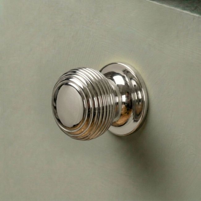 A 30mm Individual Polished Nickel Beehive Cabinet Knob Shown Upright on a White Background A 30mm Individual Polished Nickel Beehive Cabinet Knob Shown Upright on a White Background