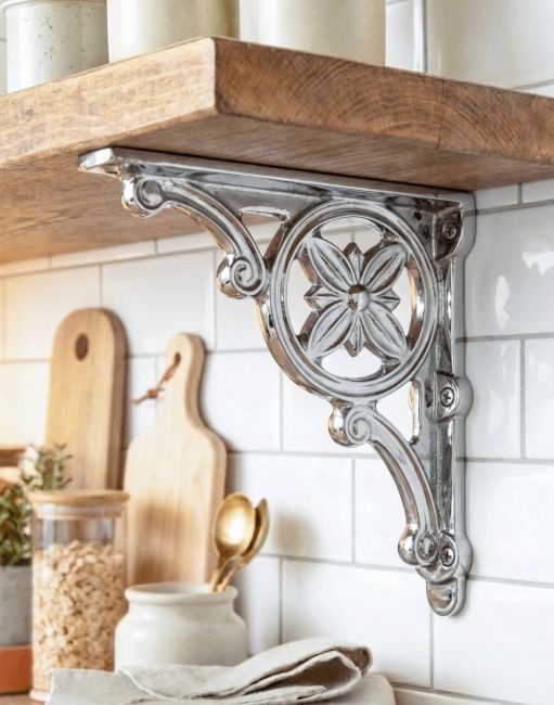 The 31 x 28cm "Delphi" Polished Bright Chrome Brackets Mounted on a White Tiled Kitchen Wall in a Contemporary Home - Digital Illustration