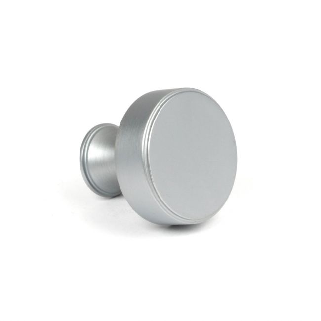 The 32mm "Atelier" Circular Cabinet Knob in Satin Chrome on a White Background Shown Side on