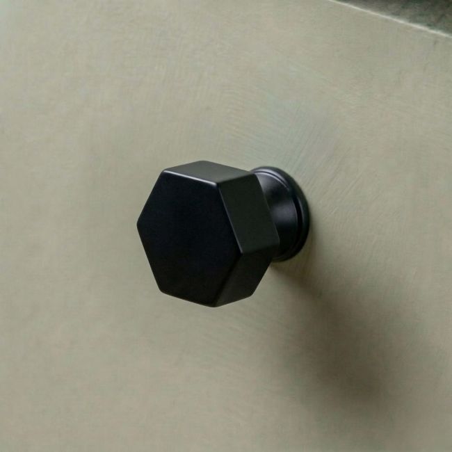 The 32mm "Vanguard" Hexagonal Cabinet Knob in Matt Black Mounted on a Kitchen Cupboard Drawer - Digital Illustration The 32mm "Vanguard" Hexagonal Cabinet Knob in Matt Black Mounted on a Kitchen Cupboard Drawer - Digital Illustration