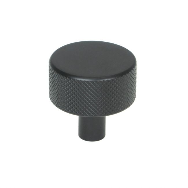 The 32mm Knurled Cabinet Knob (No Rose) in Matt Black Shown Upright on a White Background