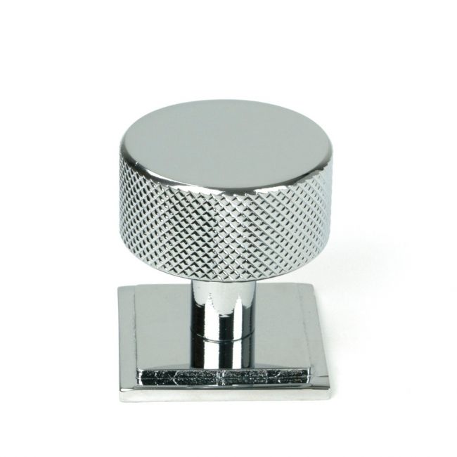 The 32mm Knurled Cabinet Knob on Square Rose in Polished Chrome Shown Upright on a White Background