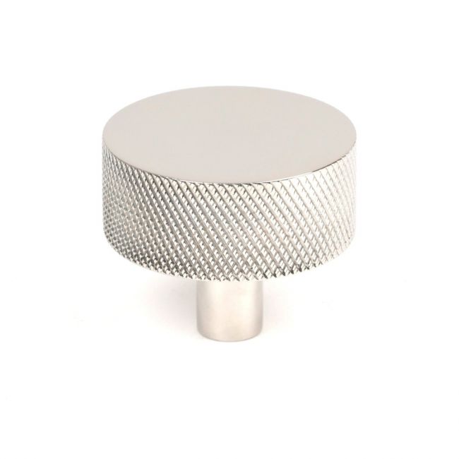 The 38mm Knurled Cabinet Knob (No Rose) in Polished Stainless Steel Shown Upright on a White Background