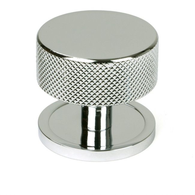 The 38mm Knurled Cabinet Knob on a Plain Rose in Polished Chrome Shown Upright on a White Background