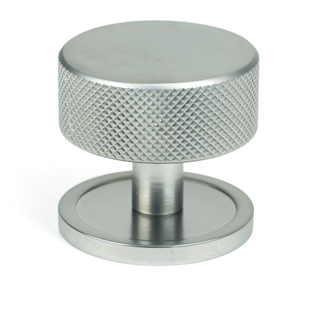 The 38mm Knurled Cabinet Knob on a Plain Rose in Satin Chrome Shown Upright on a White Background