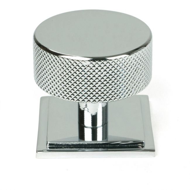 The 38mm Knurled Cabinet Knob on a Square Rose in Polished Chrome Shown Upright on a White Background
