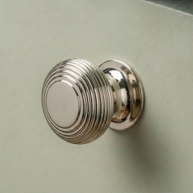 The 40mm Individual Polished Nickel Beehive Cabinet Knob Fitted on a Modern Kitchen Cupboard Drawer in Sage Green - Digital Illustration The 40mm Individual Polished Nickel Beehive Cabinet Knob Fitted on a Modern Kitchen Cupboard Drawer in Sage Green - Digital Illustration