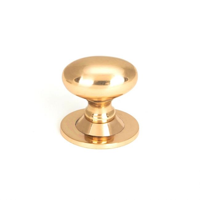 The Polished Bronze 40mm Traditional Oval Cabinet Knob Shown Upright on a White Background 