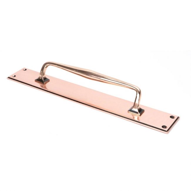The 425mm Swelled Grip Door Handle with Backplate in Polished Bronze on a White Background The 425mm Swelled Grip Door Handle with Backplate in Polished Bronze on a White Background