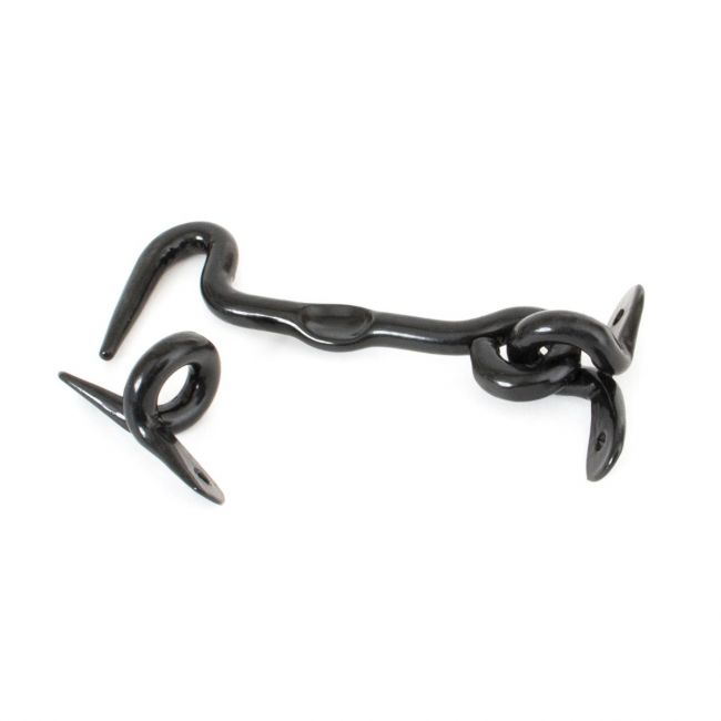 The 4 Inch Forged Iron Cabin Hook in a Black Finish on a White Background