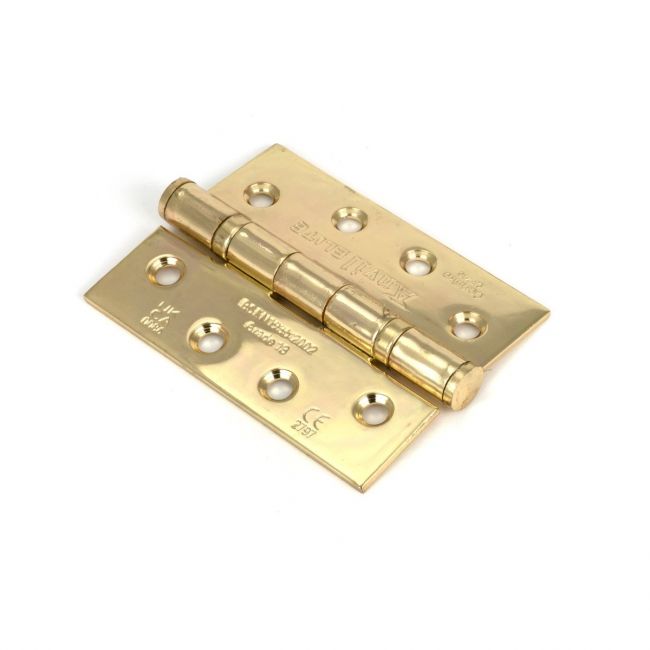 The 4 Stainless Steel Ball Bearing Butt Hinges (Pair) in Polished Brass on a White Background