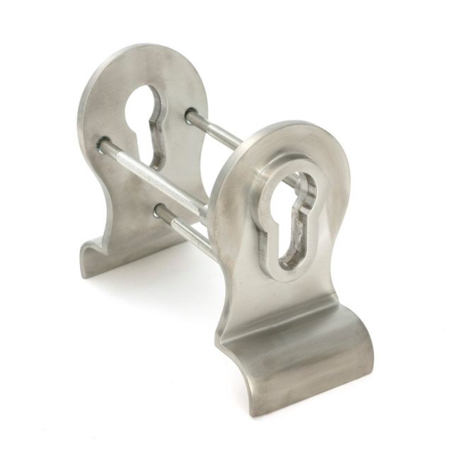 The 50mm Curved Euro Cylinder Back-to-Back Door Pull Set in Satin Stainless Steel on a White Background Shown at an Angle