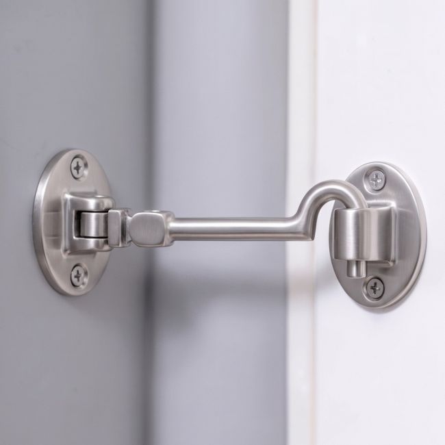 Silent Type Holding Open a White Door in a Modern Home - Digital Illustration Silent Type Holding Open a White Door in a Modern Home - Digital Illustration