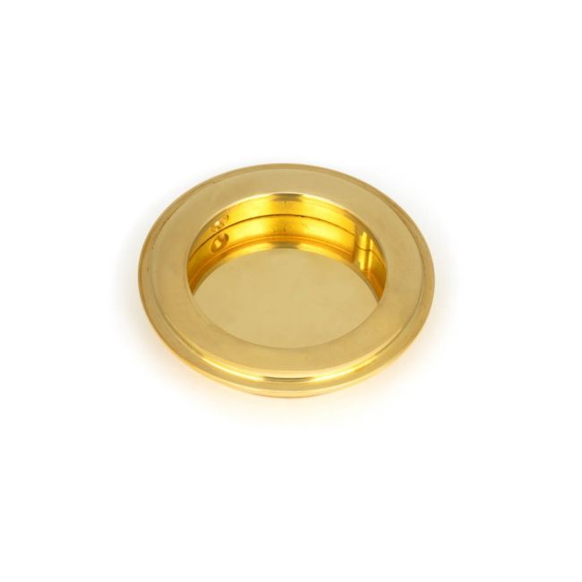 The 75mm Art Deco Round Flush Pull Handle in Polished Brass shown up close on a White Background