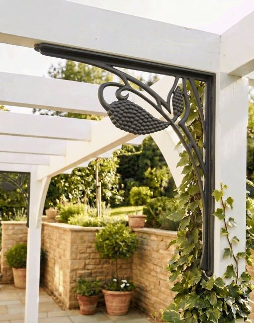 The 78cm x 64cm "Florentyne” Gallows Bracket Mounted on a White Outdoor Garden Structure - Digital Illustration