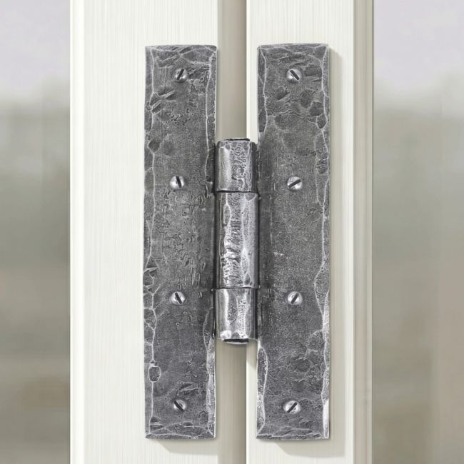 The 7" Pewter H Hinge Pair Fixed onto a White Wooden Window Frame in a Modern Home - Digital Illustration