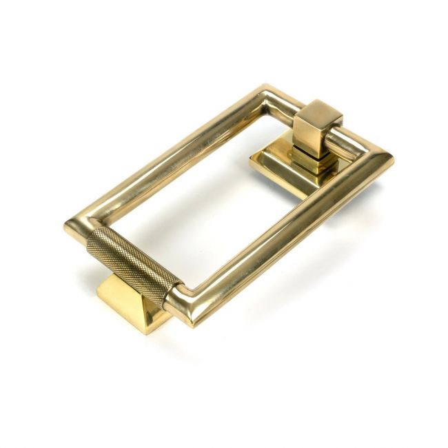The Aged Brass Modern Knurled Rectangular Door Knocker on a White Background The Aged Brass Modern Knurled Rectangular Door Knocker on a White Background