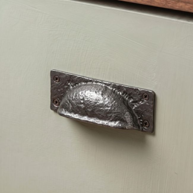 The Antique Black Iron Hooded Cabinet Or Drawer Pull Handle Fitted on a Wooden Kitchen Drawer in a Traditional Cottage - Digital Illustration The Antique Black Iron Hooded Cabinet Or Drawer Pull Handle Fitted on a Wooden Kitchen Drawer in a Traditional Cottage - Digital Illustration