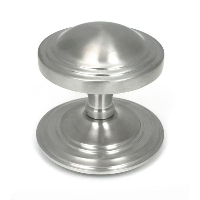 The Art Deco Stepped Rose Center Door Knob in Satin Stainless Steel Shown Upright on a White Background