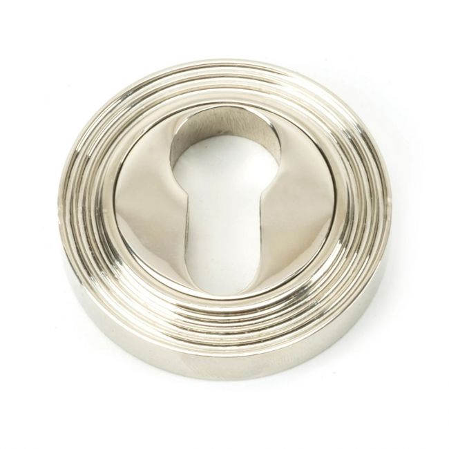 The Beehive Concealed Standard Euro Escutcheon - Polished Nickel on a White Background The Beehive Concealed Standard Euro Escutcheon - Polished Nickel on a White Background
