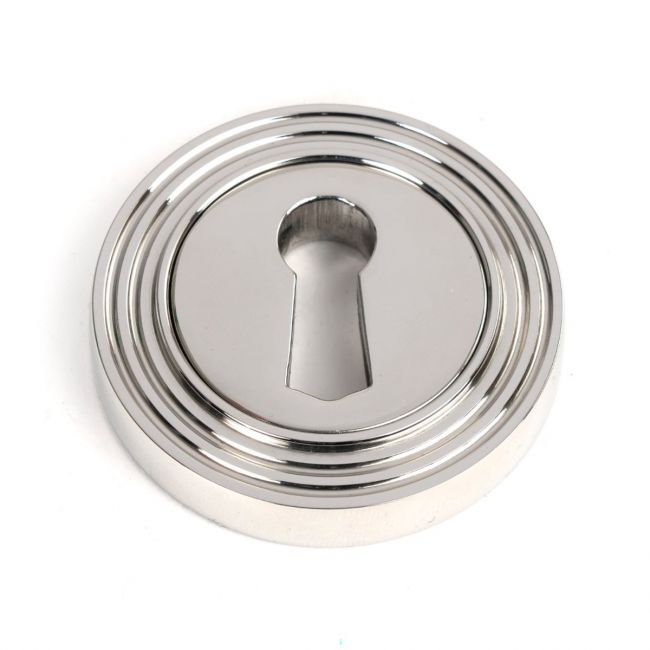 The Beehive Concealed Standard Keyhole Escutcheon in Polished Stainless Steel Shown on a White Background