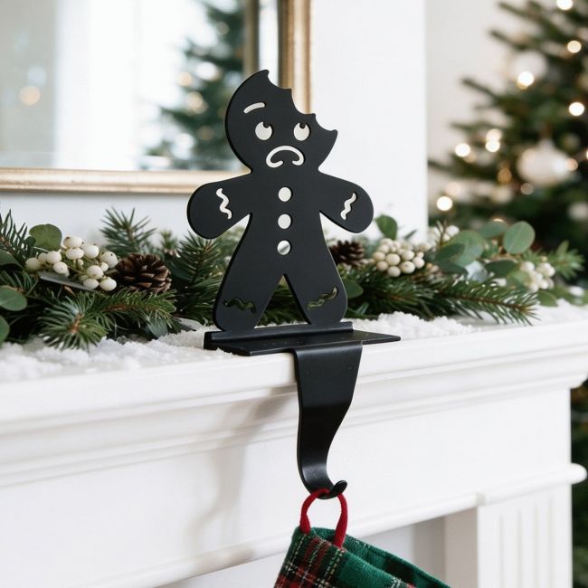 Bitten Gingerbread Man Stocking Holder in Situ on a Mantel Piece Bitten Gingerbread Man Stocking Holder in Situ on a Mantel Piece