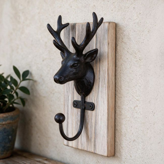 The Black and Natural Wood Stag Coat Hook Mounted on a Textured Wall in a Modern Interior Setting - Digital Illustration The Black and Natural Wood Stag Coat Hook Mounted on a Textured Wall in a Modern Interior Setting - Digital Illustration