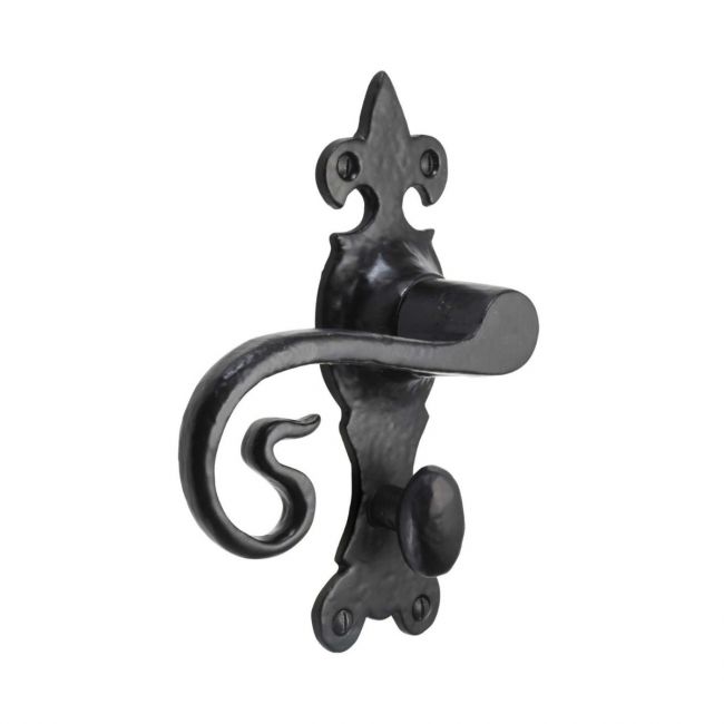 The Black Antique Fleur-de-Lis Bathroom Door Handles - Ornate Monkey Tail Privacy Pair on a White Background The Black Antique Fleur-de-Lis Bathroom Door Handles - Ornate Monkey Tail Privacy Pair on a White Background