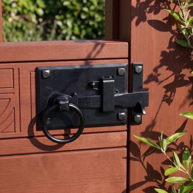 The Black Heavy Duty Thumb Latch Fitted on a Garden Gate in a Country Home - Digital Illustration