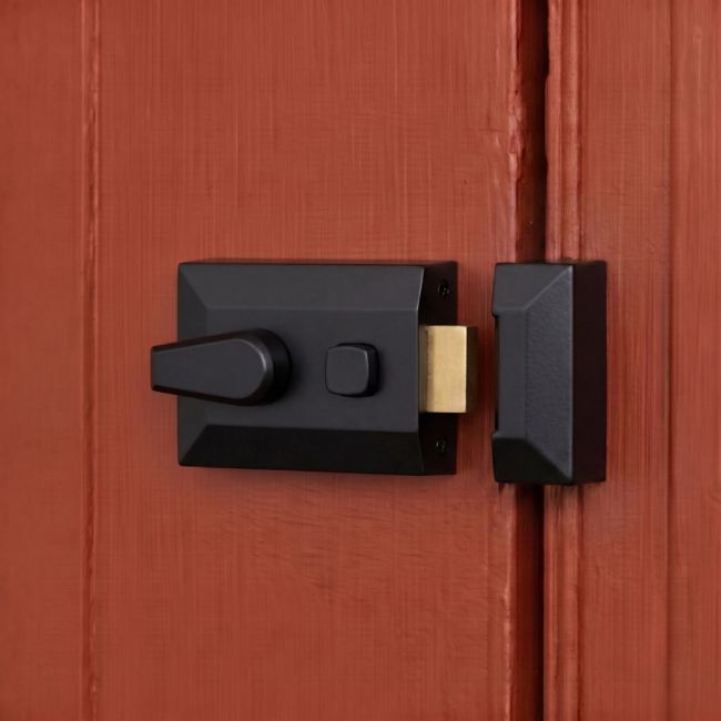 The Black Iron Door Night Latch on a Burnt Orange Coloured Country Home Door - Digital Illustration The Black Iron Door Night Latch on a Burnt Orange Coloured Country Home Door - Digital Illustration