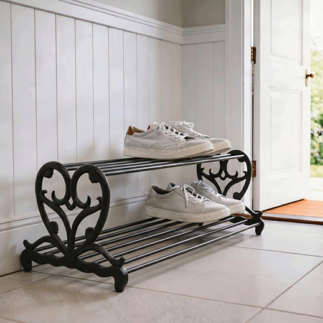 The Black “Loredana” Heart Shoe Stand Positioned in a Modern Tiled House Entranceway - Digital Illustration The Black “Loredana” Heart Shoe Stand Positioned in a Modern Tiled House Entranceway - Digital Illustration