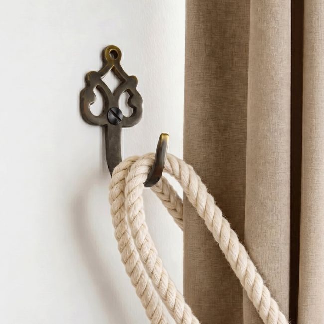 The ’Blaneau’ Curtain tie back Mounted on a Modern White Interior Home wall - Digital Illustration The ’Blaneau’ Curtain tie back Mounted on a Modern White Interior Home wall - Digital Illustration